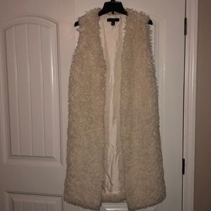 White fur vest